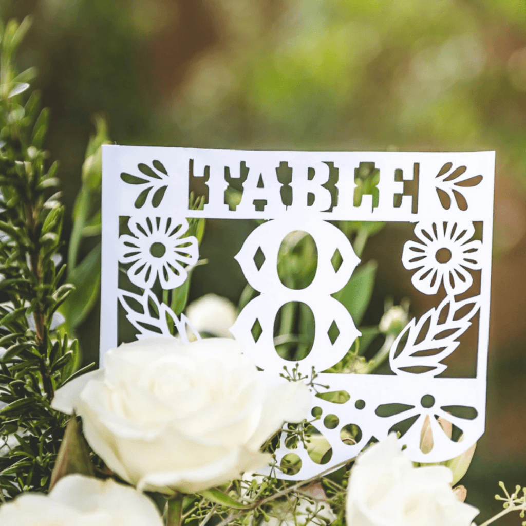 Floral wedding table number flags in custom colors