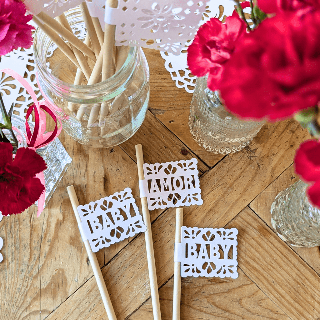 Papel picado party straws with white shimmer flags on kraft straws