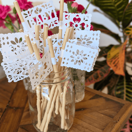 Papel picado party straws with white shimmer flags on kraft straws