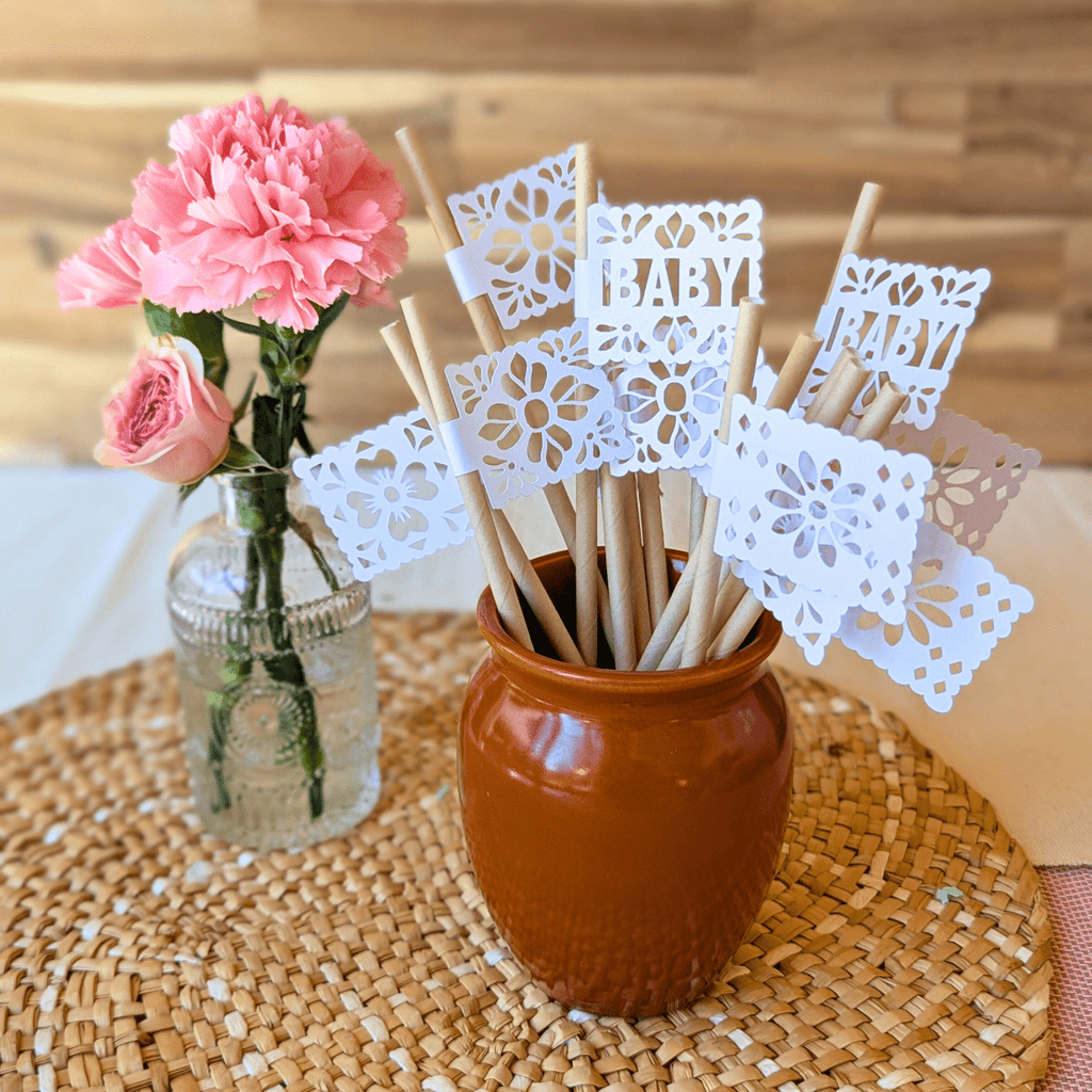 Papel picado party straws with white shimmer flags on kraft straws