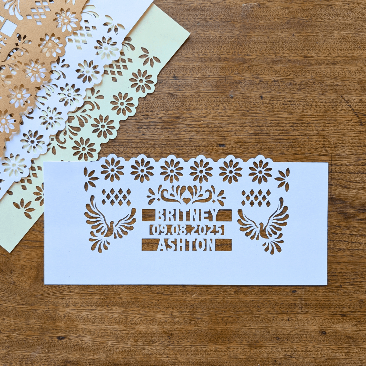 Personalized paper wedding luminaries with custom names and date